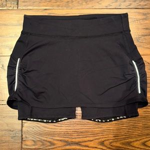 Athleta women’s black skort, size medium